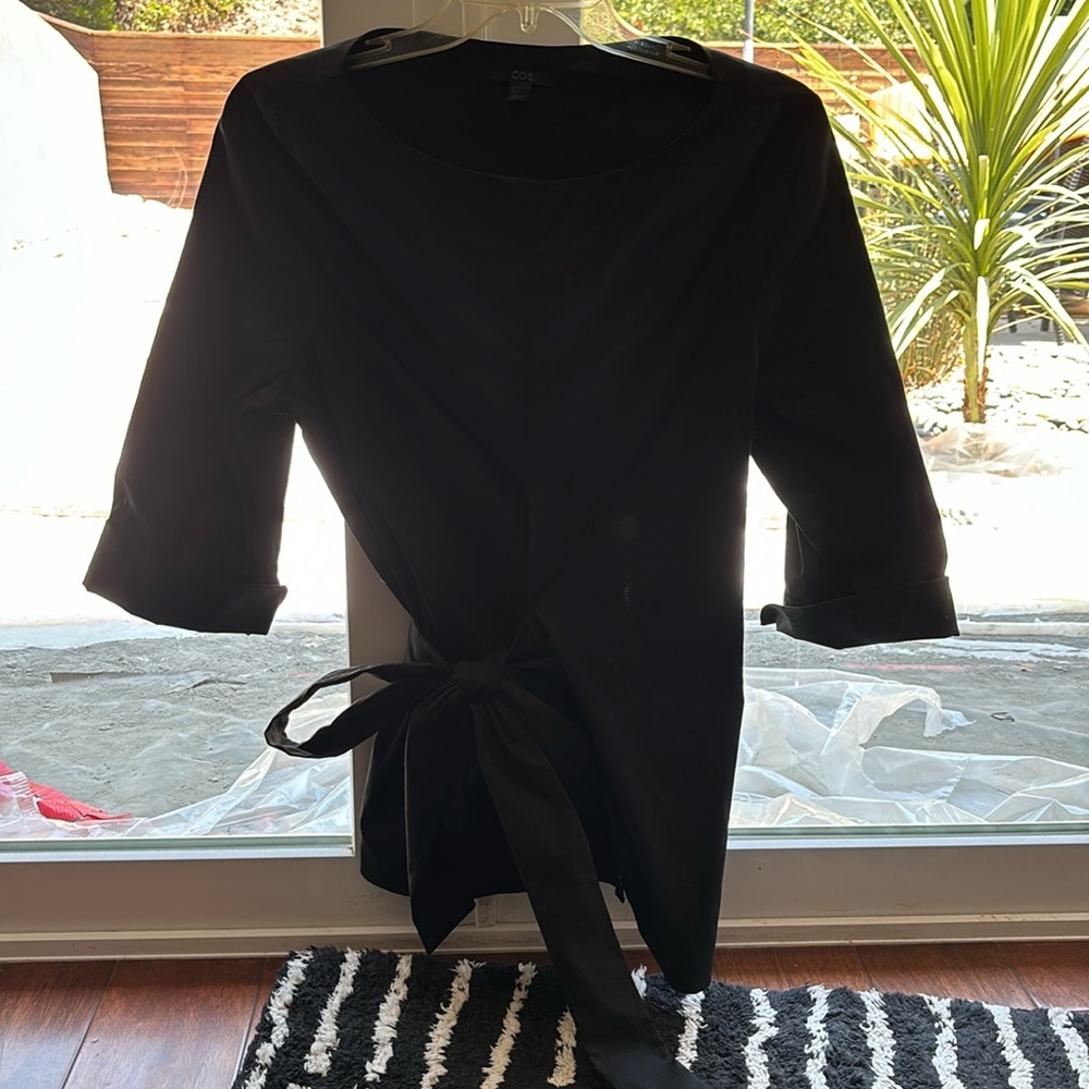 COS black cotton blouse with side sash and three quarter sleeve with cuff size 8